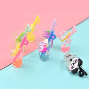 Detailed view of colorful DIY resin miniature fruit drink cups with fruit slices