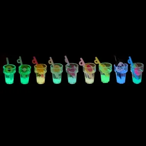 Detailed view of colorful glow-in-the-dark miniature resin drink cups for DIY resin crafts