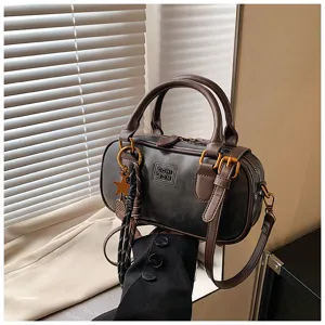 Stylish retro bowling shoulder bag for women, trendy vintage PU leather casual handbag.