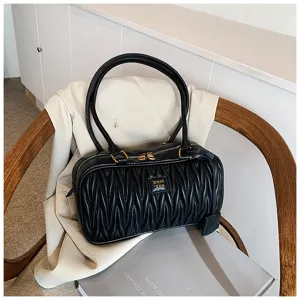 Black quilted shoulder bag for women, chic casual pillow bag with dual handles and metal zipper.