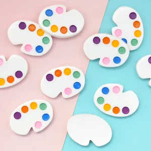 Colorful miniature resin paint palettes for DIY crafts and micro dollhouse decorations.