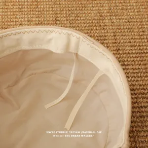Detailed view of the vintage suede beret hat interior, showing exquisite craftsmanship.