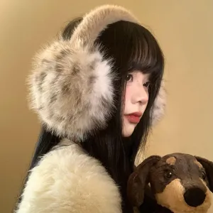 Fluffy winter earmuffs for women, warm plush leopard print ear warmers for cold weather.