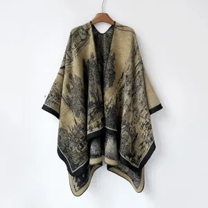 Beige vintage landschaftsmotiv bedruckter strick cape schal mit elegantem offenen design.