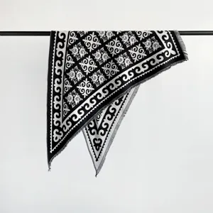 Black and white patterned jacquard shawl scarf with fringe, cozy winter wrap for women.
