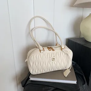 White pleated shoulder bag for women, casual PU leather pillow purse with dual straps.