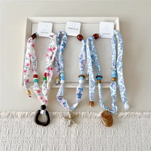 Chique smalle lange zijden sjaal ketting met decoratieve kralen en unieke hangers.