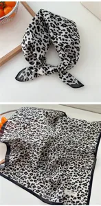 Detailed view of women cotton linen small square scarf with classic leopard print retro style.