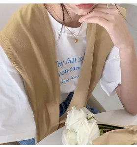 Solid color knitted women shawl, stylish Korean fashion shoulder wrap for summer outfits.
