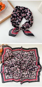 Detailed view of the elegant floral square scarf featuring a stylish red and white border.