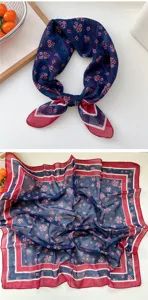 Detailed view of women floral square silk scarf, chic navy blue neckerchief with red white border.