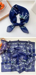 Detailed view of the stylish navy blue floral square scarf, lightweight and breathable fabric.