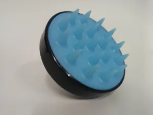 Soft silicone scalp massage shampoo brush detail view for effective hair washing and cleaning tool.