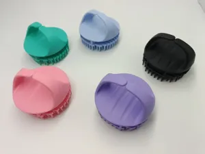 Silicone scalp massage brush detail view, soft bristles for gentle hair washing and relaxing.