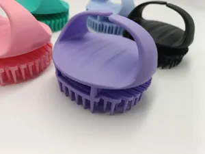 Silicone scalp massage shampoo brush with ergonomic handle for deep cleaning and hair care.
