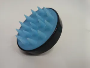 Silicone scalp massager shampoo brush for deep cleaning and relaxing hair wash routine.