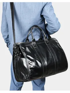 Vintage echt lederen heren reistas, grote capaciteit business bagage tas detail view.