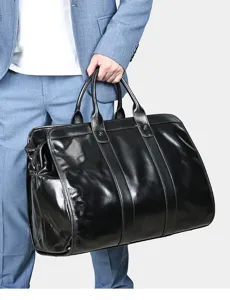 Retro zwarte lederen reistas voor heren, grote capaciteit zakelijke bagage en sporttas.