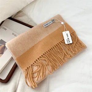 Cozy camel herringbone woolen scarf with fringe detail, soft winter warm accessory for women.