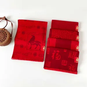 Red New Year scarf with horse pattern and festive FU character design. Soft warm winter shawl.