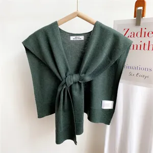 Dark green knitted shawl for women, elegant tie front capelet, lightweight cardigan accessory.