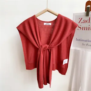 Knit shawl detail, solid color decorative draped scarf, elegant layering fashion accessory
