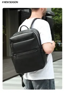Vue détaillée du sac à dos en cuir noir, avec texture premium et doubles fermetures éclairs.