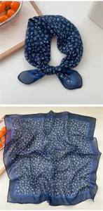 Detailed close-up view of the blue floral square scarf, highlighting fabric and print.