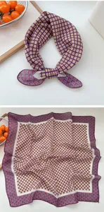 Vista dettagliata del foulard quadrato con stampa geometrica e raffinata trama del tessuto.