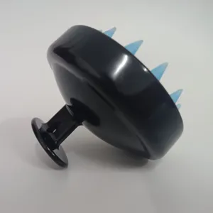 Black scalp massage shampoo brush with blue silicone bristles for hair care and cleaning.