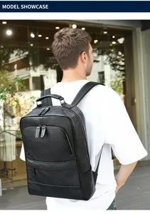 Detailed view of black genuine leather men business casual backpack with large capacity.