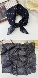 Detailed view of the soft cotton linen polka dot square scarf texture and neat fabric edge.