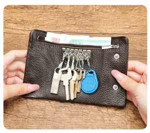 Genuine leather key wallet coin purse two in one with key hooks and zipper pocket.