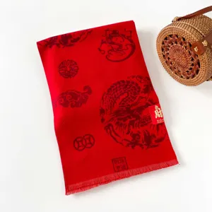 Red festive scarf with Chinese dragon pattern, traditional New Year gift accessory.