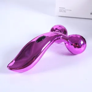 Purple 3D facial roller massager with dual diamond cut wheels for face lifting and firming.