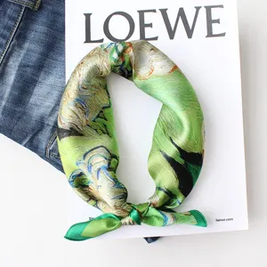 Detailed close-up view of the green oil painting art printed silk square scarf.