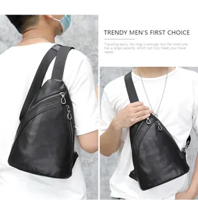 Detail view of the black leather chest bag showcasing the sleek triangle design and zipper.