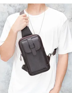 Men's leather sling bag chest pack, premium brown cowhide texture, detailed daily wear shot.
