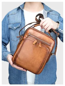 Premium retro brown leather messenger bag with multi-pockets for men's daily commute.