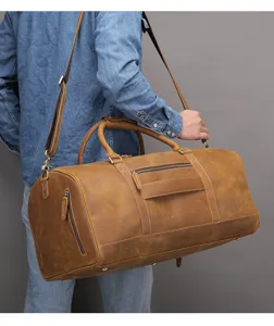 Echte lederen reistas duffel bag voor heren, grote capaciteit draagbare retro bagagetas details.