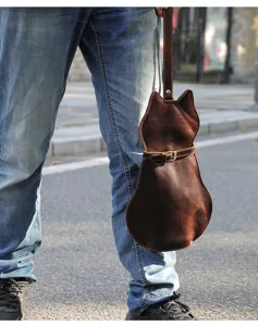 Retro genuine leather cat shaped shoulder bag, quirky cute crossbody pouch for women daily use.