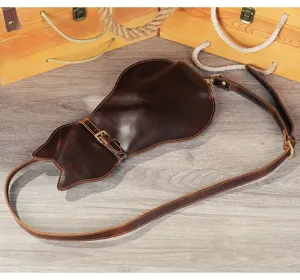 Detail view of genuine crazy horse leather cute cat shaped shoulder cross body bag.