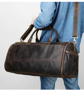 Vintage leather travel duffel bag for men, large capacity weekender bag with shoulder strap.