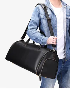 Men genuine leather travel duffel bag large capacity business luggage bag with shoulder strap.