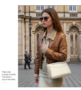 Minimalist cream leather shoulder bag with zipper pocket for women daily commute and fashion.