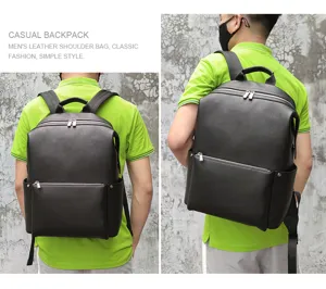 Sac à dos en cuir pour homme, élégant cartable d'ordinateur noir avec poches zippées.