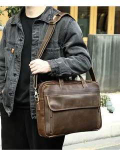 Men's vintage crazy horse genuine leather briefcase, stylish business shoulder bag detail.