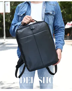 Sac à dos d'affaires en cuir noir classique pour hommes, idéal pour les déplacements.