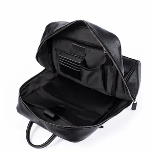 Sac à dos d'affaires pour hommes en cuir véritable avec plusieurs poches intérieures.