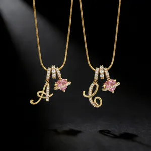 Gold plated letter A and pink planet zirconia pendant necklace set for women fashion.
